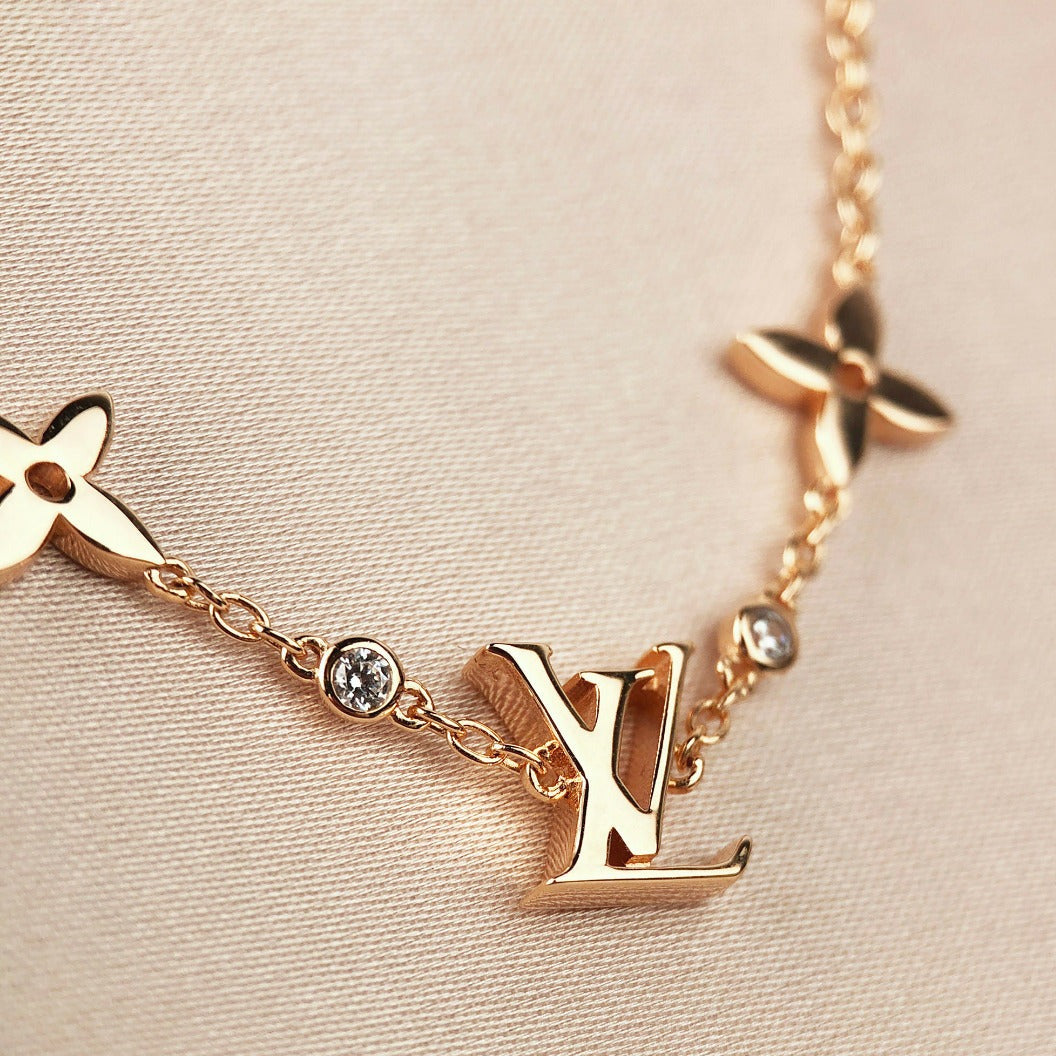 [Favorite]STAR AND SUN 7 MOTIFS GOLD BRACELET