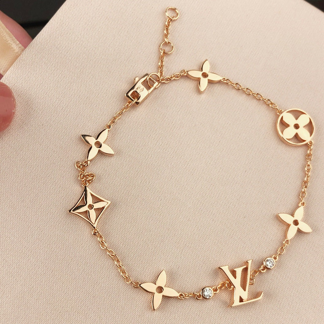 [Favorite]STAR AND SUN 7 MOTIFS GOLD BRACELET