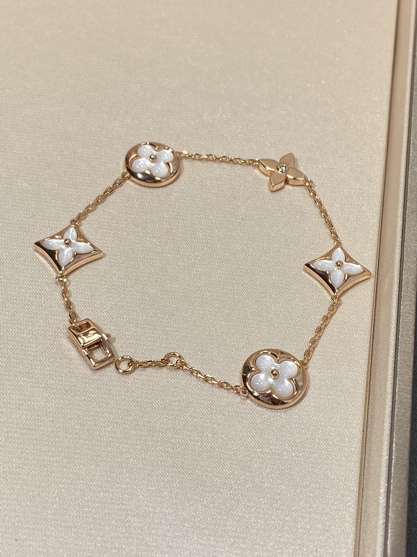 [Favorite]STAR AND SUN 5 MOTIF MOP ROSE GOLD BRACELET