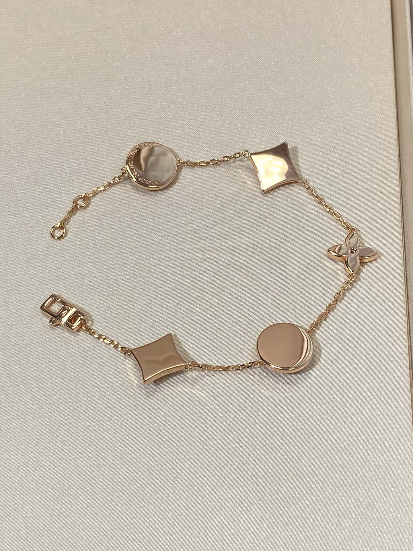 [Favorite]STAR AND SUN 5 MOTIF MOP ROSE GOLD BRACELET