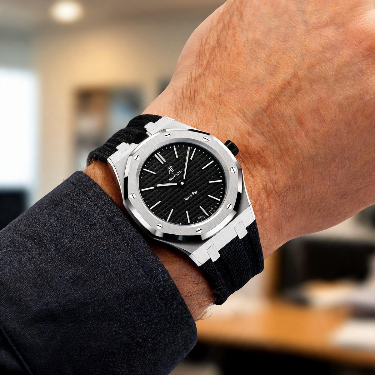 Boîtier en acier et bracelet à recouvrement intégral en fluoroélastomère
